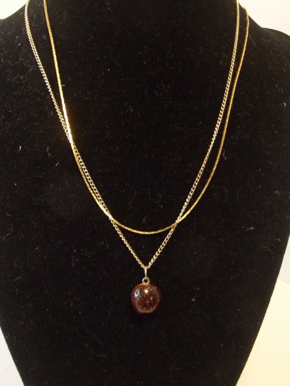 Two Gold Tone Chain Necklaces - one with Apple Pendant